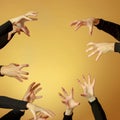 Many hands reaching out up in the air Royalty Free Stock Photo