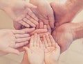 Many hands together: group of people joining hands Royalty Free Stock Photo