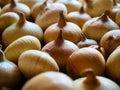Many heads of Golden and brown onions are lying on the table, close-up, top view. Organic, agricultural culinary background. Royalty Free Stock Photo
