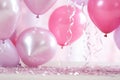 many heart heart foil balloons surrounding pink confetti