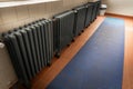 Many heaters in a row on large corridor