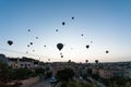 Many hot-air ballons over Goreme town at sunrise Royalty Free Stock Photo