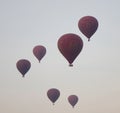 Many hot air balloons flying over the temples in Bagan, Myanmar