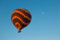 Many huge balloons are flying in the air at the sunrise. Cappadocia, Turkey.