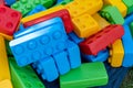 Many huge colorful toy bricks in heap