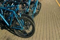 Many identical bicycles in a row