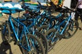 Many identical bicycles in a row