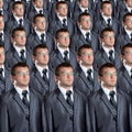 Many identical businessmen clones Royalty Free Stock Photo