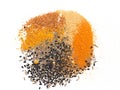 many spices including Ginger Curry Turmeric Chili pepper Black cumin Nigella sativa over white