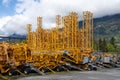 Many industrial cranes ready to be installed on construction sites