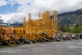 Many industrial cranes ready to be installed on construction sites