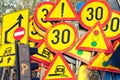 Many industrial road signs stacked together