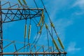 Many insulators on the wires of a tower of a high voltage power line Royalty Free Stock Photo