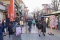 Many Japanese people are walking in the Denpoin street with many kinds of shops beside next to Asakusa tmple at Tokyo, Japan