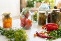many jars with pickled vegetables mix inside, preparation for winter seasons Royalty Free Stock Photo