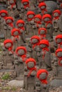 Many jizo with red hat