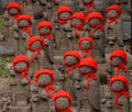 Many jizo with red hat