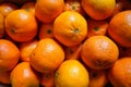 Many juicy clementines at vegetable market