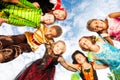 Many kids, Halloween costumes look down in circle Royalty Free Stock Photo