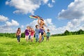 Many kids have fun with kite Royalty Free Stock Photo