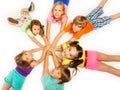 Many kids laying on a floor Royalty Free Stock Photo