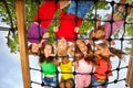 Many kids look though gridlines of playground