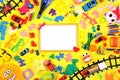 Many kids toys frame on yellow background. Childhood concept. top view, flat lay. copy space Royalty Free Stock Photo
