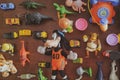 Many kids toys at wooden table top view