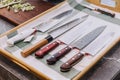 Many kind of Sharpen Japanese kitchen knives with empty price tag Royalty Free Stock Photo