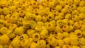 Many yellow heads of LEGO figure. Box in a shop
