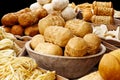 Many kinds of oscypek smoked cheese next to korbacik cheese on b