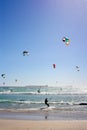 Many Kiteboarders in Water