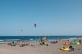 Many kitesurfer and windsurfer on ocean at surfer beach El Medan Royalty Free Stock Photo