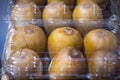 Many kiwi fruit in transparent plastic