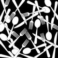 Many knives, forks and spoons lying mixed up