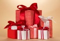 Many large and small Christmas gifts on beige