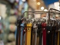 Many leather belts for sale at the shop market