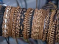 Many leather bracelets on sale