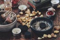 Many little pieces of light yellow Yemen frankincense resin incense on dark wooden table Royalty Free Stock Photo