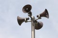 Many loudspeakers against cloudy blue sky Royalty Free Stock Photo