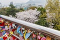 Many love locks locked on a heart shap metal in Geumgang Park