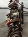 Many love padlocks locked on iron chain with perspective Royalty Free Stock Photo