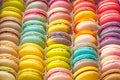 Many macaroon cookies with different tastes in a box