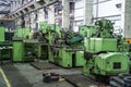 Many machine tools for metalworking in large workshop of plant. Heavy industry. Industrial interior