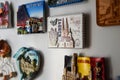 Many magnets on the refrigerator from the countries of the world A new fridge magnet from the last vacation travel Royalty Free Stock Photo