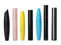 Many mascaras for eyelashes on white. Makeup product