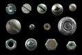 Many metal heads of screws, nuts, rivets Royalty Free Stock Photo