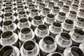 many metal pipe couplings in a pipe factory