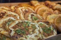 Many mini pizzas on counter close-up