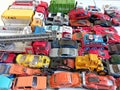 many miniature metal cars, diecast models of toy cars, trucks, sedans, jeeps, children's toys.